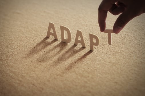 Someone placing the letters of the word 