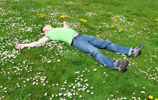 Person laying down in the grass 