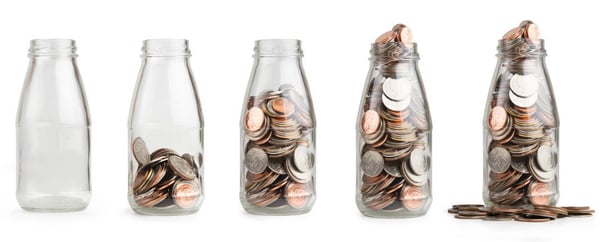 Milk bottles with change in them 