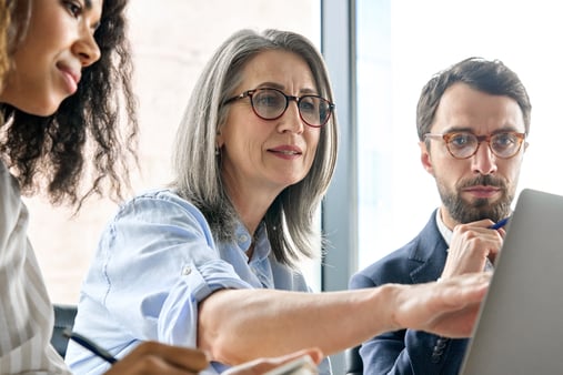 Concept of collaboration. An employer or broker explaining employer benefits. 