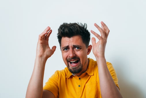 A man that is acting scared and ready to give up 