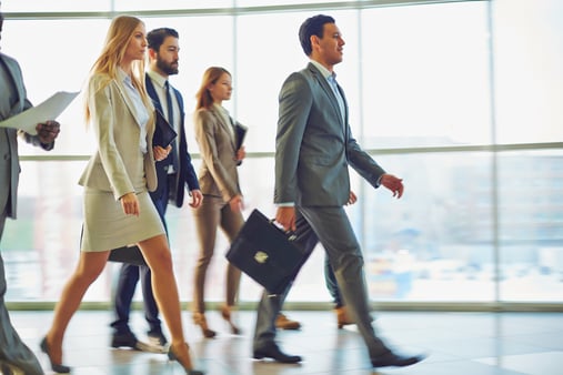 Concept of leaders and leadership. One person walking in front of everyone. 