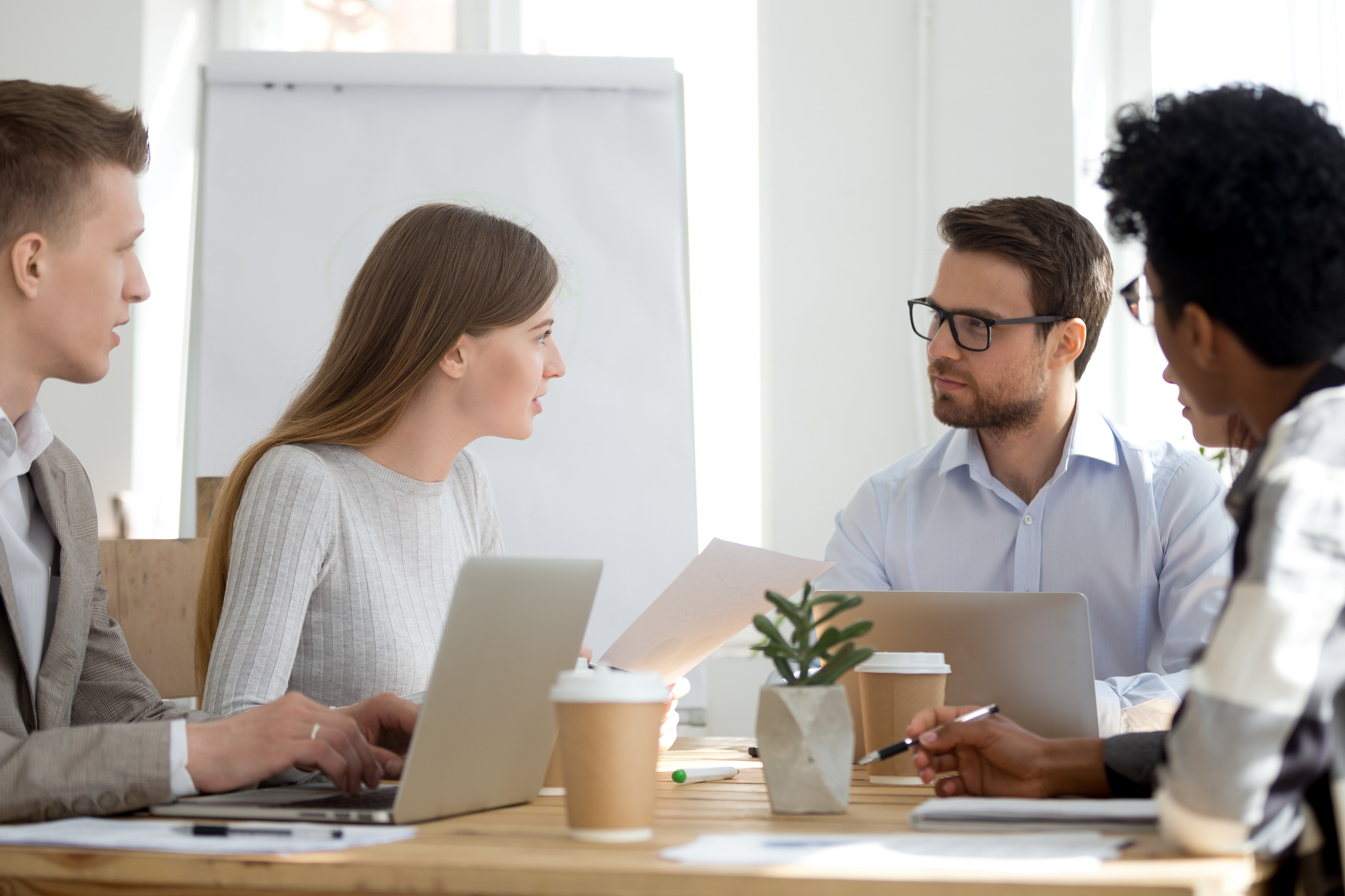 Employees discussing non-insurance benefits